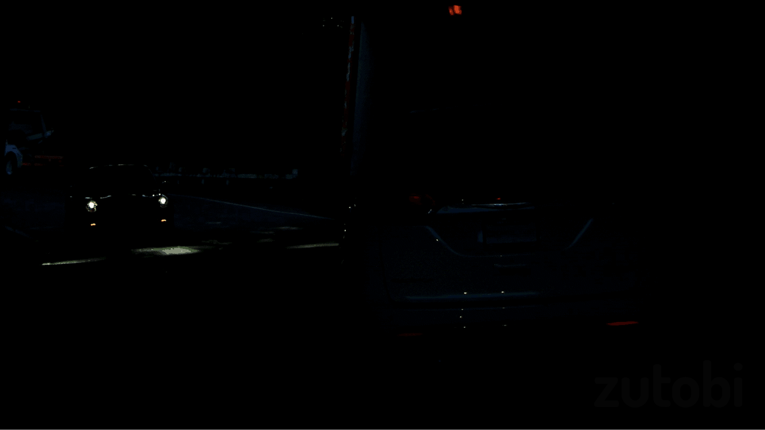 Can you spot the vehicle without lights on the right side of this picture?