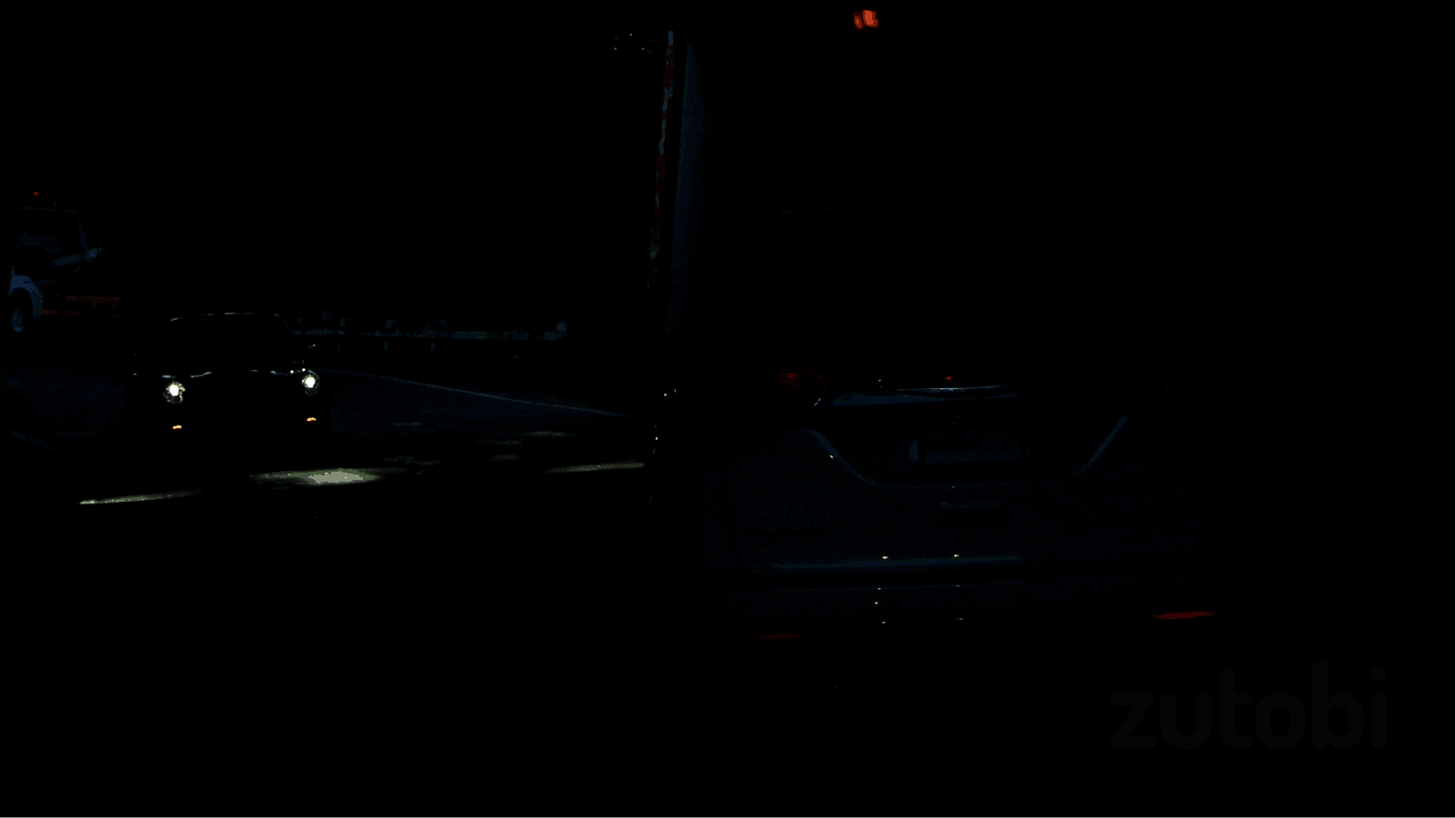 Can you spot the vehicle without lights on the right side of this picture?